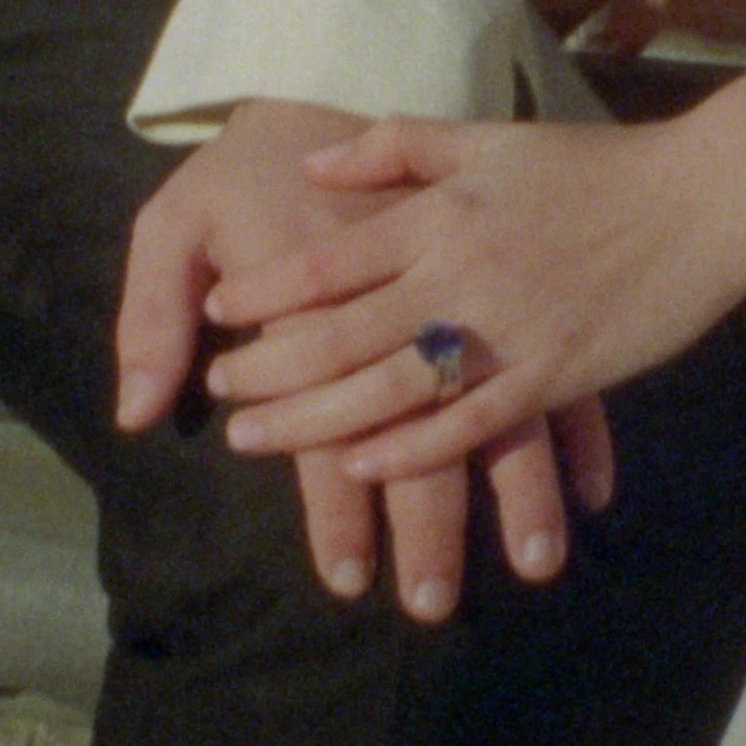 Xadani and Sebastian's hands with the engagement ring